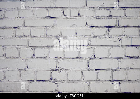 Blank abstract background with smooth brick surface, painted with white paint. Light layout for labels Stock Photo