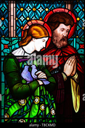 Stained glass window by Henry Holiday 1863 Shimpling church, Suffolk, England, UK Pre-Raphaelite artist - Mary and Joseph Stock Photo