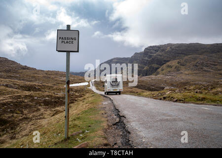 View of single track road on Bealach na Ba pass on Applecross Peninsula  the North Coast 500 driving route in northern Scotland, UK Stock Photo