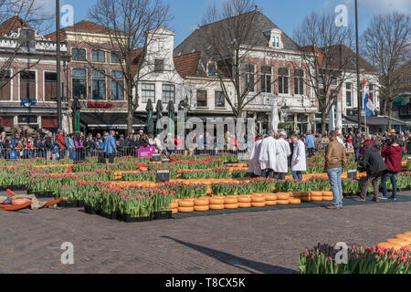 Alkmaar, the Netherlands - April 12, 2019: Traditional cheese market on the Waagplein square in Alkmaar. Stock Photo