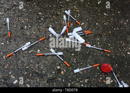A selection of needles pictured found on the street in Bognor Regis, West Sussex, UK. Stock Photo