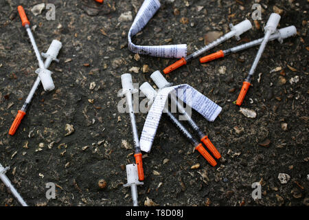 A selection of needles pictured found on the street in Bognor Regis, West Sussex, UK. Stock Photo