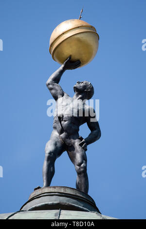 Statue of Atlas on the top of dome of Neoclassical palace by Stanislaw Zawadzki inspired by Villa Capra La Rotonda in Vicenza, Italy, in English lands Stock Photo