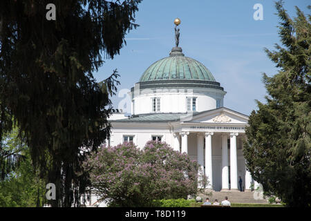 Statue of Atlas on the top of dome of Neoclassical palace by Stanislaw Zawadzki inspired by Villa Capra La Rotonda in Vicenza, Italy, in English lands Stock Photo