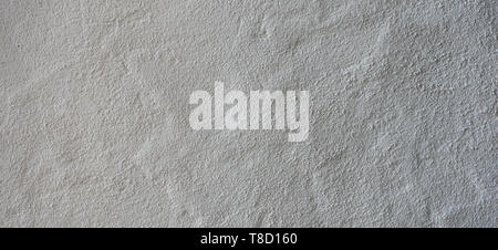 White grungy plastered cement concrete wall background texture banner Stock Photo