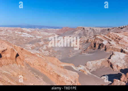 Moon Valley with surreal moonlike terrain, unusual rocky formations, sand dunes, Atacama desert, Chile, South America . Stock Photo