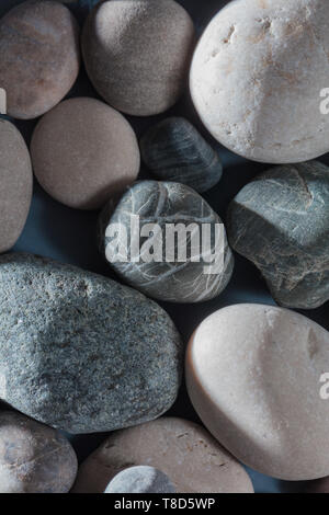 stones from holidays, the sea. top view photo, pile of grey and black stones Stock Photo