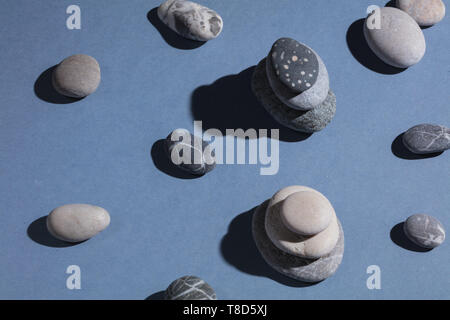 seeking and collecting stones of various shapes, top view close up photo Stock Photo