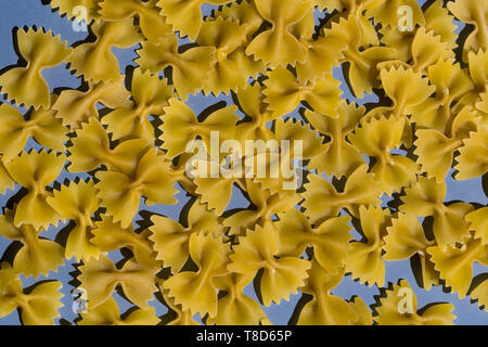 a pile of macaroni on the kitchen table, busines, Homemade Italian pasta, macaroni industry, Stock Photo