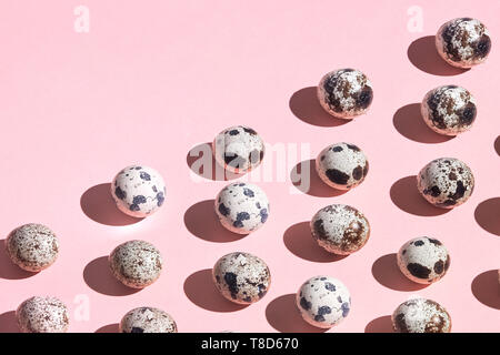 Geometric composition of tiny eggs in the corner, copy space. game for kids, entertainment Stock Photo