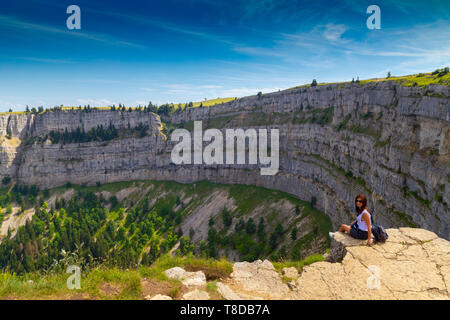 Creux du Van is a natural rock circus of approximately 1,400 meters wide and 150 meters deep, on the north side of Le Soliat. It is located in the Val Stock Photo