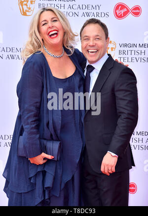 Hannah Walters and Stephen Graham attending the Virgin Media BAFTA TV awards, held at the Royal Festival Hall in London. Stock Photo