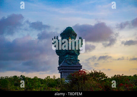 Picture of Garuda statue as Bali landmark with blue sky as a background. Balinese traditional symbol of hindu religion Stock Photo