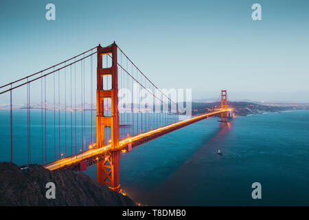 Panoramic view of famous Golden Gate Bridge seen from Battery Spencer viewpoint in beautiful post sunset twilight during blue hour, San Francisco, USA Stock Photo