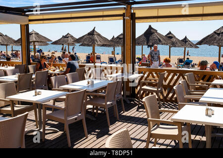 Terrace of a chiringuito bar on the beach of La Cala. Mijas coast. Costa del Sol, Málaga province. Andalusia, Southern Spain. Europe Stock Photo