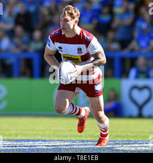 Halliwell Jones Stadium, Warrington, UK. 12th May, 2019. Coral Challenge Cup rugby sixth round, Warrington Wolves versus Wigan Warriors; Sam Powell of Wigan Warriors runs forward with the ball Credit: Action Plus Sports/Alamy Live News Stock Photo