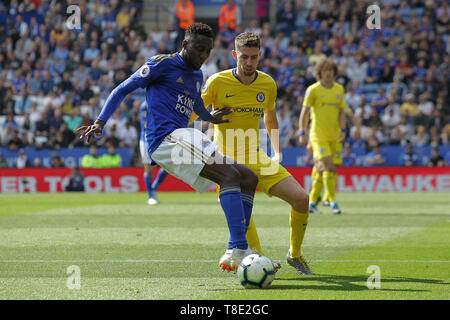 LEICESTER, ENGLAND. 12th May Leicester City midfielder Wilfred Ndidi battling with Jorginho of Chelsea during the Premier League match between Leicester City and Chelsea at the King Power Stadium, Leicester on Sunday 12th May 2019. (Credit: Alan Hayward | MI News ) Editorial use only, license required for commercial use. Photograph may only be used for newspaper and/or magazine editorial purposes. Credit: MI News & Sport /Alamy Live News Stock Photo