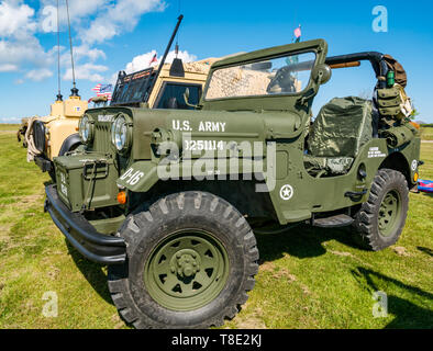 Museum of Flight, East Fortune, East Lothian, Scotland, UK 12th May, 2019. Wartime Experience: A family day out with all things related to the World Wars. Second world war American US army vehicles on display with the stars and stripes flag Stock Photo