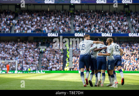 London, UK. 12th May, 2019. Teammates celebrate with goalscorer Christian Eriksen of Spurs 2-2 during the final Premier League match of the season between Tottenham Hotspur and Everton at Tottenham Hotspur Stadium, White Hart Lane, London, England on 12 May 2019. Photo by Andy Rowland. Editorial use only, license required for commercial use. No use in betting, games or a single club/league/player publications.Õ Credit: PRiME Media Images/Alamy Live News Stock Photo