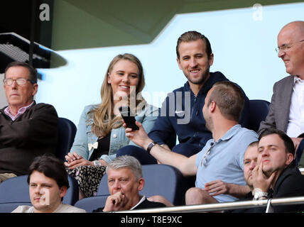 London, UK. 12th May, 2019. Harry Kane (TH) watches the game from the stands with his partner Katie Goodland at the Tottenham Hotspur v Everton English Premier League match, at The Tottenham Hotspur Stadium, London, UK on May 12, 2019. **Editorial use only, license required for commercial use. No use in betting, games or a single club/league/player publications** Credit: Paul Marriott/Alamy Live News Stock Photo