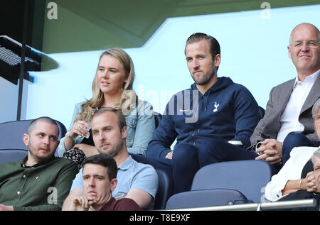 London, UK. 12th May, 2019. Harry Kane (TH) watches the game from the stands with his partner Katie Goodland, at the Tottenham Hotspur v Everton English Premier League match, at The Tottenham Hotspur Stadium, London, UK on May 12, 2019. **Editorial use only, license required for commercial use. No use in betting, games or a single club/league/player publications** Credit: Paul Marriott/Alamy Live News Stock Photo