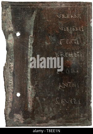 A Roman fragment of a military diploma 1st/2nd century AD. Bronze with fine, green patina. Rectangular plate with engraved inscription, the rim perforated two times. 10 x 13.5 cm. Provenance: South German private collection, 1970s and later. historic, historical, Roman Empire, ancient world, ancient times, ancient world, Additional-Rights-Clearance-Info-Not-Available Stock Photo