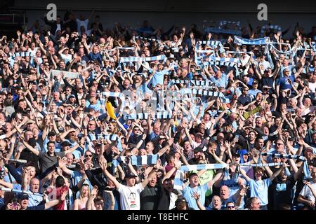 City fans celebrate winning the title during the Premier League match between Brighton & Hove Albion and Manchester City  at the American Express Community Stadium 12 May 2019 Photo Simon Dack/Telephoto Images Editorial use only. No merchandising. For Football images FA and Premier League restrictions apply inc. no internet/mobile usage without FAPL license - for details contact Football Dataco Stock Photo