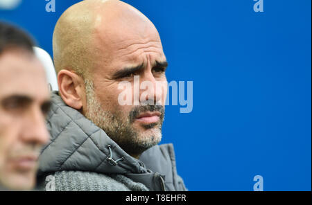 Manchester City manager Pep Guardiola looks concerned during the Premier League match between Brighton & Hove Albion and Manchester City  at the American Express Community Stadium 12 May 2019 Photo Simon Dack / Telephoto Images Editorial use only. No merchandising. For Football images FA and Premier League restrictions apply inc. no internet/mobile usage without FAPL license - for details contact Football Dataco Stock Photo