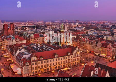 Aerial view of the sunset of Stare Miasto with Market Square, Old Town Hall and St. Elizabeth's Church from St. Mary Magdalene Church in Wroclaw Stock Photo