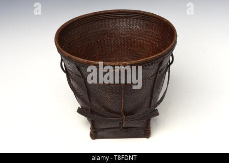 antique brown wicker basket on gradient background Stock Photo