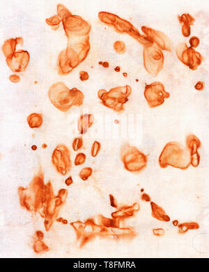 Rusty stains on white cloth. Smooth smoky contours, bright rust color, fabric texture Stock Photo