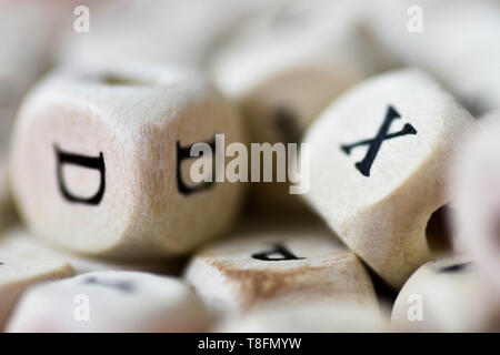cubes beads letters alphabet. background of wooden cubes with alphabet letters, learning letters Stock Photo
