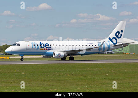 Flybe Embraer ERJ-175 aircraft, registration G-FBJD, taking off at Manchester Airport, England. Stock Photo