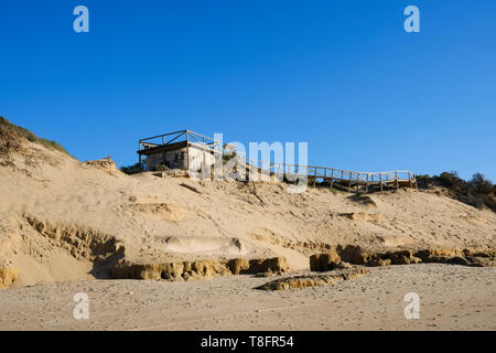 A viewing platform has been built on top of wartime coastal lookout bunkers at Playa Rota beach, Rota, Andalucía, Spain. Stock Photo