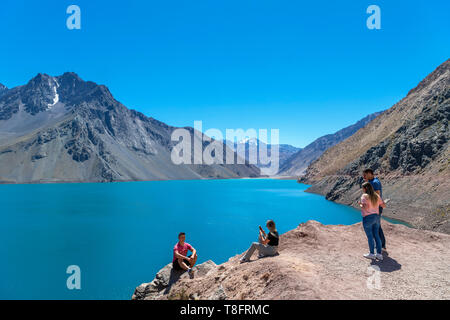 Chile, Andes Mountains. Tourists at the Embalse el Yeso (El Yeso Dam), Andes Mountains, Santiago Metropolitan Region, Chile, South America Stock Photo