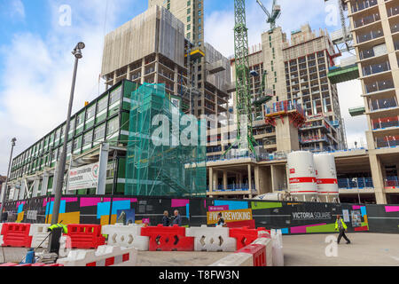 Woking, Surrey: construction of the new high rise mixed use Victoria Square development continues with concrete cores and tower cranes Stock Photo