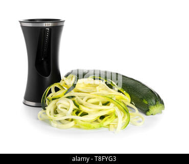 Fresh zucchini spaghetti with spiral grater isolated on white Stock Photo
