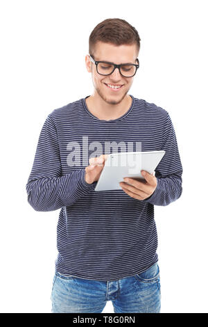 Handsome young man with tablet PC on white background Stock Photo