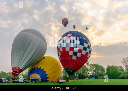 Krosno, Poland, May 4, 2019: Hot Air Balloon Championship of Poland and Mountain Balloon Competition. Morning flight. Stock Photo