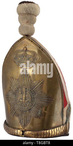 A grenadier cap M 1894 for enlisted men in Tsar Alexander Guard Grenadier Regiment no. 1, circa 1900 Gilt brass shield with embossed guard star under a royal crown, convex gilt brass chinscales with leather underlay. Red bag, white lace, white edging with three applied flaming grenade symbols (brass, gilt). Affixed black-white pompom. Leather liner with loops. Signs of age, with replacements, re-worked, original parts utilised. Rare. historic, historical, Prussian, Prussia, German, Germany, militaria, military, object, objects, stills, clipping, , Additional-Rights-Clearance-Info-Not-Available Stock Photo