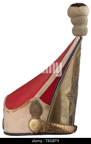 A grenadier cap M 1894 for enlisted men in Tsar Alexander Guard Grenadier Regiment no. 1, circa 1900 Gilt brass shield with embossed guard star under a royal crown, convex gilt brass chinscales with leather underlay. Red bag, white lace, white edging with three applied flaming grenade symbols (brass, gilt). Affixed black-white pompom. Leather liner with loops. Signs of age, with replacements, re-worked, original parts utilised. Rare. historic, historical, Prussian, Prussia, German, Germany, militaria, military, object, objects, stills, clipping, , Additional-Rights-Clearance-Info-Not-Available Stock Photo