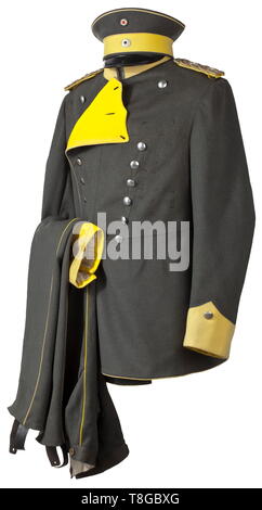 Prince Alfons of Bavaria (1862 - 1933) - a field-grey uniform Model 1916 as general of the cavalry of the 1st Bavarian Heavy Cavalry Regiment The visor cap made from fine, field-grey woollen cloth with lemon yellow decorative straps and piping around the lid. Two cockades, grey internal lining made from silk with cipher and the Bavarian king's crown, brown leather sweatband. The cloth of field-grey surcoat as before, two rows of buttons, lemon yellow Polish cuffs and piping. The buttons made from nickel, the collar with Bavarian attribute's borde, Additional-Rights-Clearance-Info-Not-Available Stock Photo