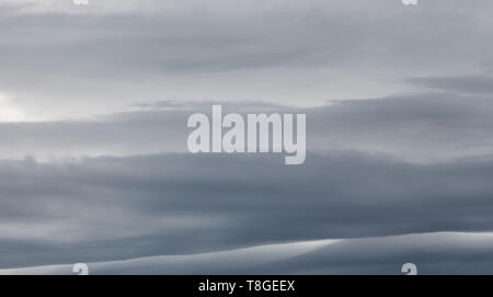 Sky with dramatic dark storm clouds. Sky before rain. Stock Photo