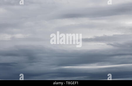Sky with dramatic dark storm clouds. Sky before rain. Stock Photo