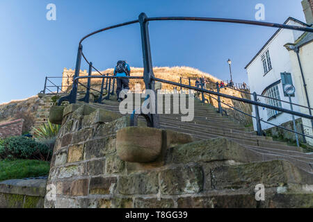 A close up view of the 199 steps up to Whitby Abbey and church on the east cliff of the scenic fishing town Stock Photo