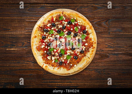 Mozzarella pizza; on wooden table; top view; copy space; pizza; italian food; mozzarella; Stock Photo