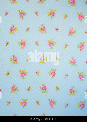 drawing of pink flowers on blue background with white dots. design Stock Photo