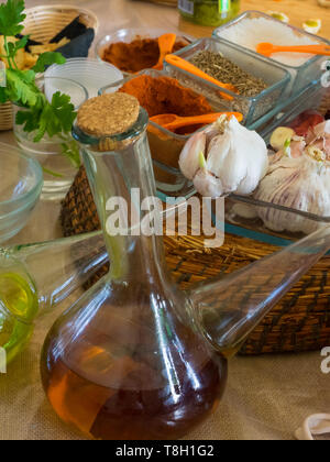 Ingredients to prepare the typical sauces of Canarian cuisine, green mojo and mojo picon (red) Stock Photo