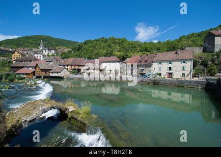 France, Doubs, Loue valley, one of many thresholds over the river reflect the village of Lods one of the most beautiful villages in France Stock Photo