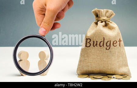 Two businessmen are discussing the company's budget. Business planning. The distribution of costs and resources. Profit taking. Search for sources of  Stock Photo